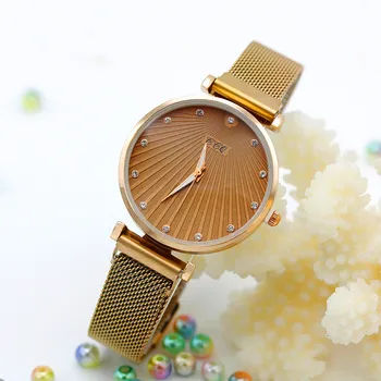 Новите стерео кварцов часовник-гривна Дамски бижута Часовници с магнитна мрежа на колана Дамски часовници Луксозни Дамски рокли Ръчен часовник